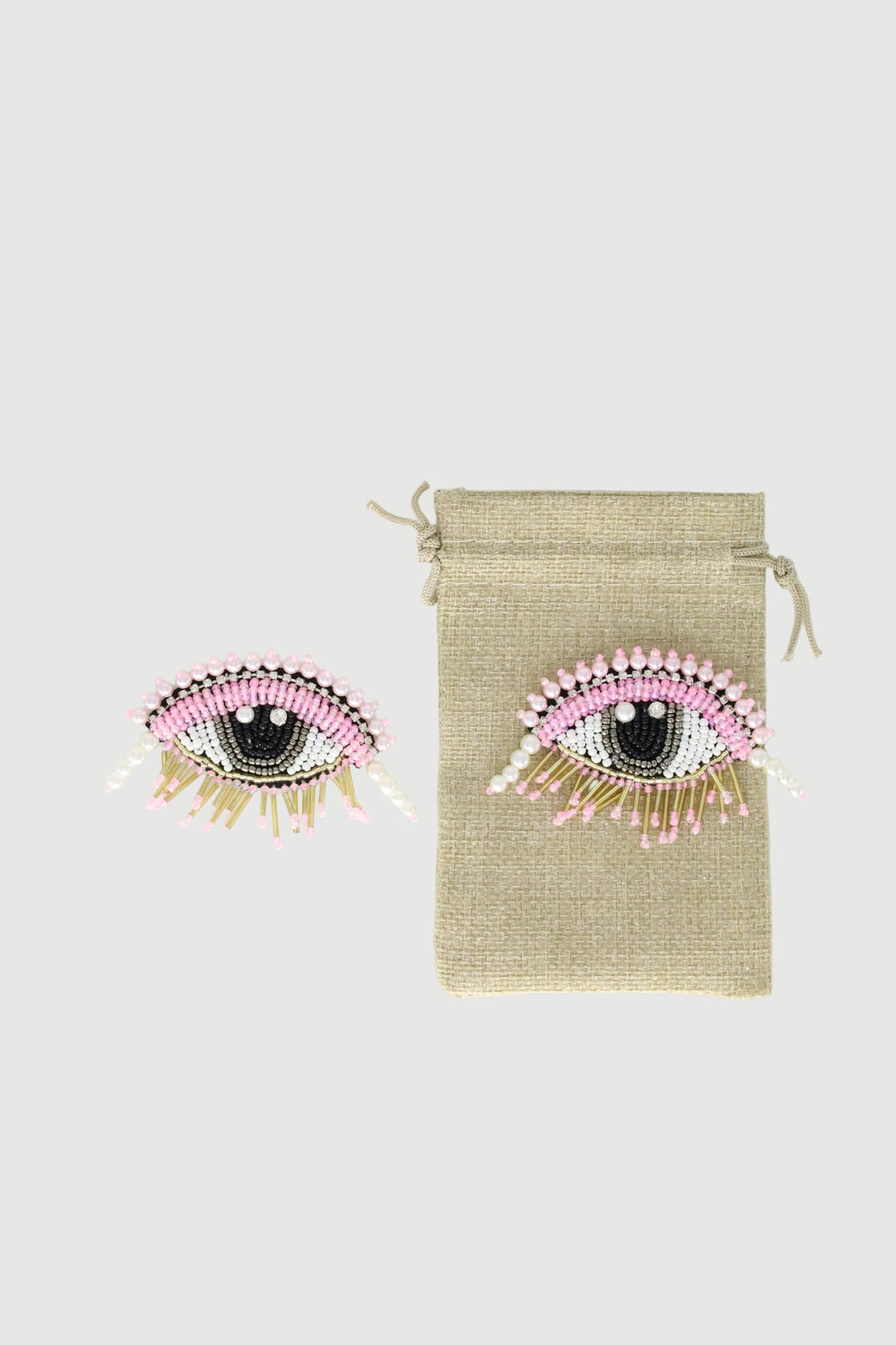 BROCHE OJO ROSA